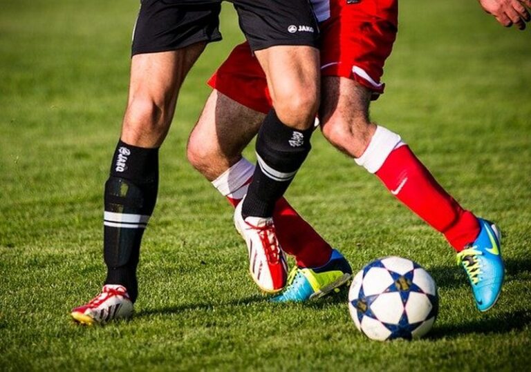 calciatori gambe