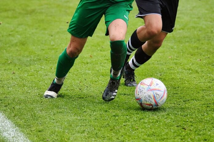 calcio giocatori gambe pallone