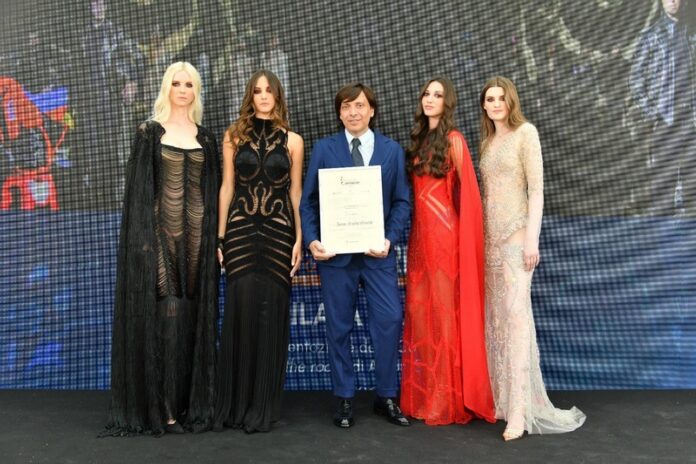 Anton Giulio Grande e modelle