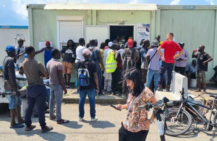 presa in carico di migranti
